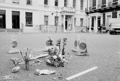 Flowers at the crime scene where Metropolitan Police officer Yvonne Fletcher was murdered outside the Libyan embassy in 1984. Getty Images