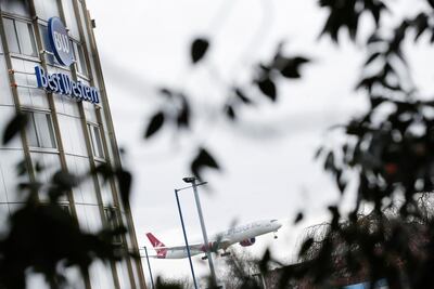 A Best Western sign is seen on the side of a building as a plane lands at Heathrow Airport, as the spread of the coronavirus disease (COVID-19) continues, in London, Britain, January 26, 2021. REUTERS/Andrew Couldridge