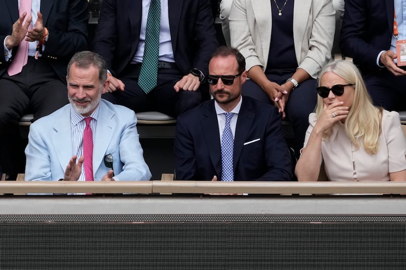 From left: Spain's King Felipe VI, Norway's Crown Prince Haakon, and Crown Princess Mette-Marit at the French Open final on Sunday. AP