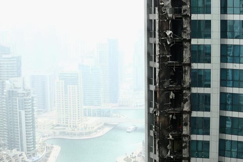 Damaged to The Torch is pictured after a fire engulfed the residential skyscraper in the Dubai Marina. Warren Little / Getty Images