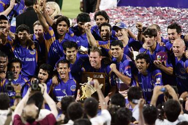 MUMBAI, INDIA - JUNE 1:  The Rajasthan Royals team celebrate with the IPL trophy after their win over Chennai in the final of IPL 1 at D.Y. Patil stadium on June 1, 2008 in Mumbai, India. (Photo by Santosh Harhare / Hindustan Times via Getty Images)