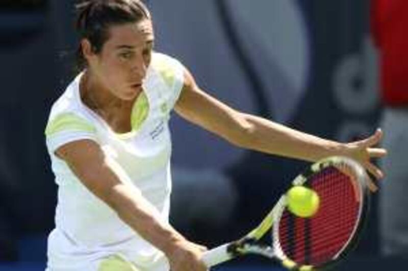 DUBAI, UNITED ARAB EMIRATES - FEBRUARY 14:  Francesca Schiavone of Italy (pictured) in action against Sorana Cirstea of Romania on the first day of the Barclays Dubai Tennis Championships WTA Tour held at the Dubai tennis stadium in Dubai on February 14, 2010. Schiavone won the match 6-2, 7-5.  (Randi Sokoloff / The National)  For Sport