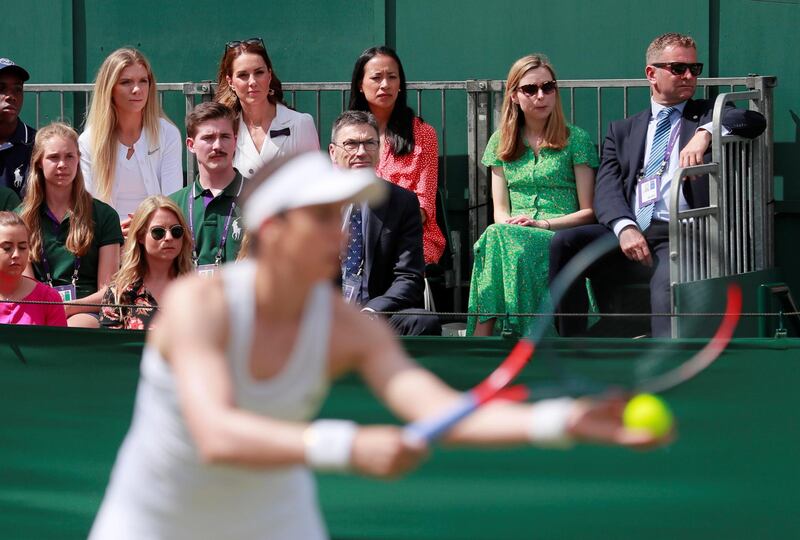 The Duchess of Cambridge looks on as Christina McHale serves. Reuters