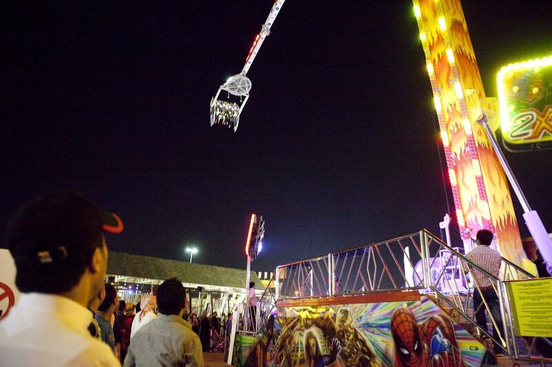 Visitors enjoyed the fun fair at Global Village. Razan Alzayani / The National