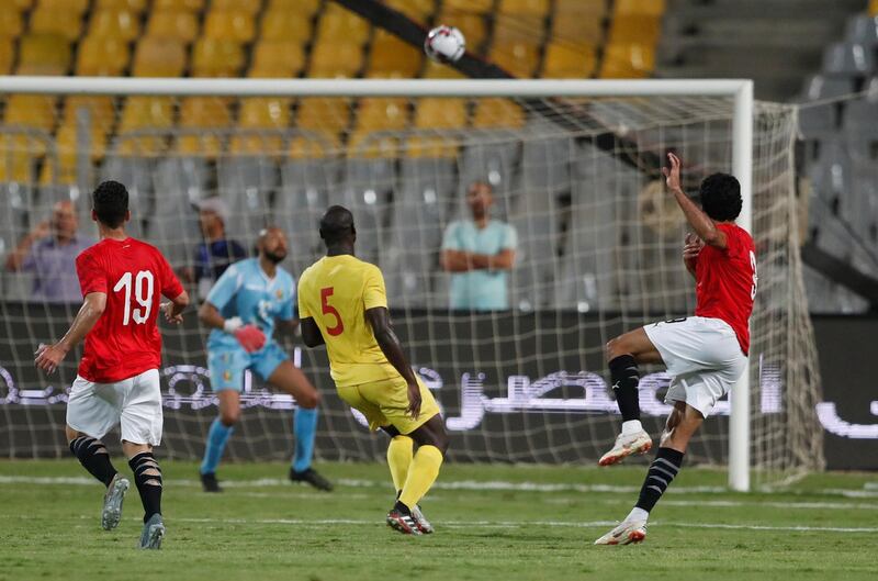 Egypt's Marwan Mohsen scores their first goal. Reuters