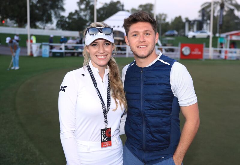 Niall Horan with Paige Spiranac during the pro-am at Emirates Golf Club. David Cannon / Getty Images