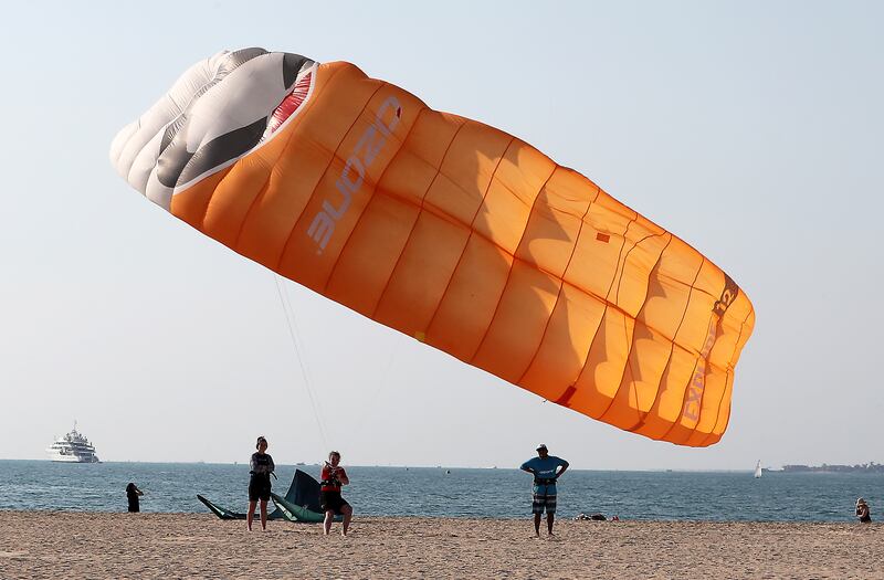 People learn to kite-surf at Sunset Beach. Pawan Singh / The National