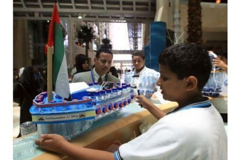Ahmad al Jaberi, a 7th grade pupil at Glenelg School of Abu Dhabi, designed a working motor boat made from plastic bottles. Ravindranath K / The National