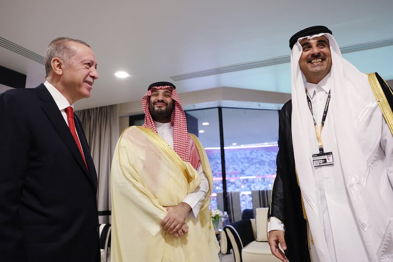 Mr Erdogan (L) meets Saudi Arabia's Crown Prince Mohammed bin Salman (C) as they are welcomed by Sheikh Tamim to Doha. AFP