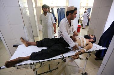 Medical staff treat one of the people injured in a suicide bombing at a wedding in Jalalabad, Afghanistan on July 12, 2019. Reuters