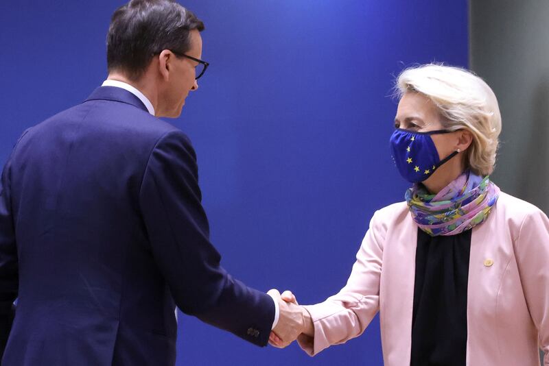 Polish Prime Minister Mateusz Morawiecki and European Commission President Ursula von der Leyen. Mr Morawiecki believes the EU is overreaching in its influence over member states. Reuters