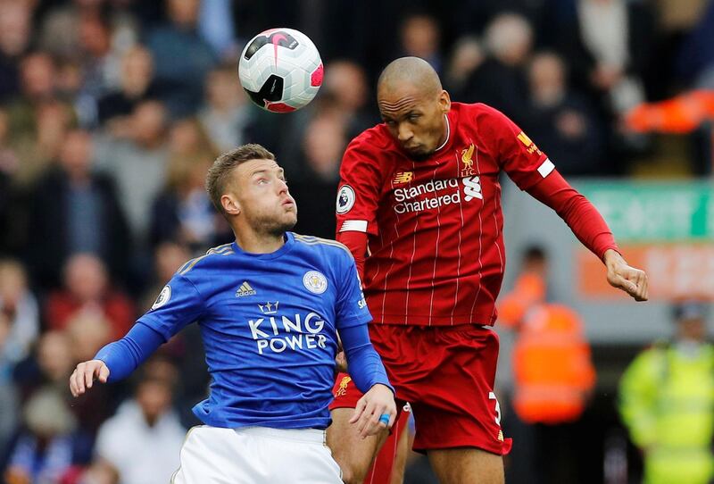 Liverpool's Fabinho with Leicester City's Jamie Vardy. Reuters