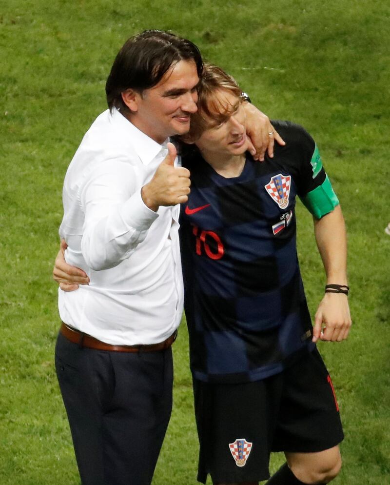 Soccer Football - World Cup - Quarter Final - Russia vs Croatia - Fisht Stadium, Sochi, Russia - July 7, 2018  Croatia's Luka Modric and coach Zlatko Dalic celebrate winning the penalty shootout   REUTERS/Christian Hartmann