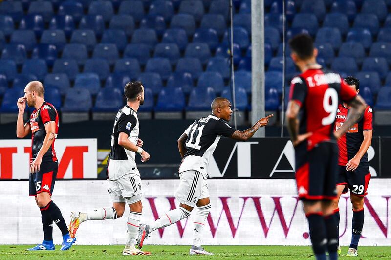 Douglas Costa celebrates after scoring Juventus' third goal. Getty Images