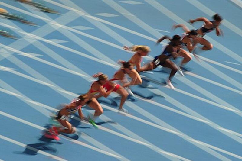 Athletes start a heat of 100m hurdles, the opening event of the heptathlon. 

Mark Ralston / AFP
