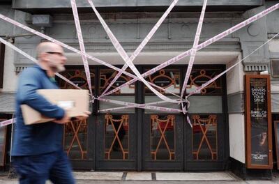 Shuttered theatres have become a regular sight in London's West End during the pandemic. Getty Images