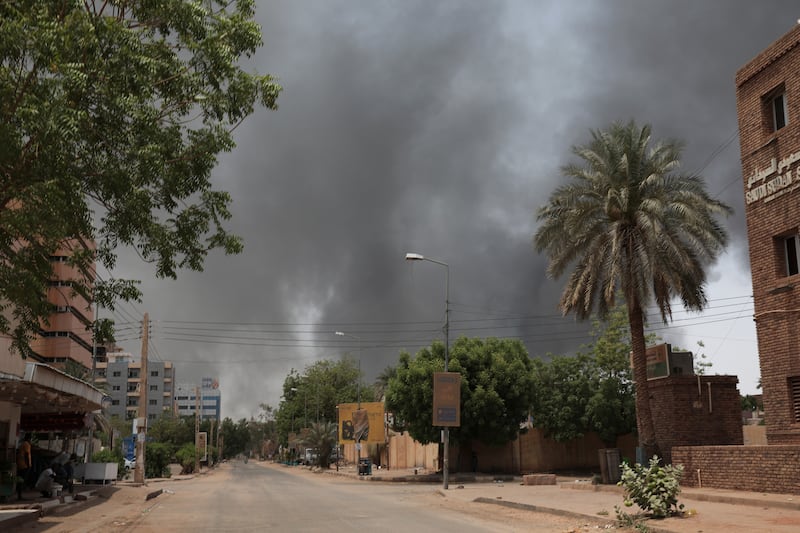 Smoke is seen rising in Khartoum on Saturday. AP