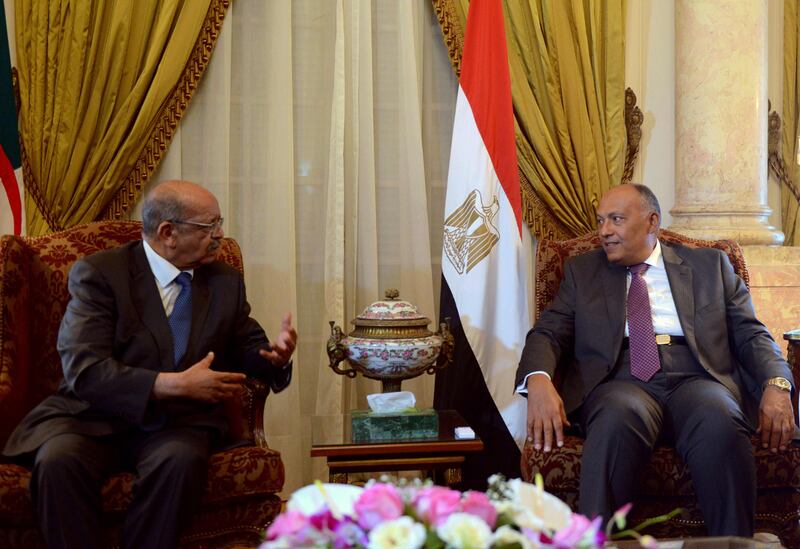 Egyptian Foreign Minister Sameh Shoukry (R) meets with his Algerian counterpart Abdelkader Messahel( L) at Tahrir Palace in Cairo on August 2, 2017. / AFP PHOTO / MOHAMED EL-SHAHED