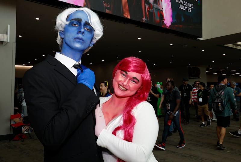 From left, Harrison Innocent cosplays as Hades and Natalie Kwant cosplays as Persephone. AP