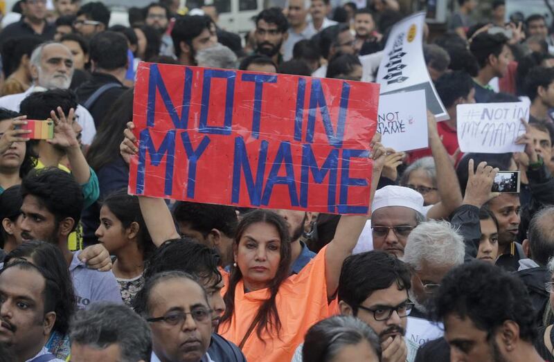 Bollywood actress Shabana Azmi holds up a placard during a protest in Mumbai against attacks by right-wing Hindu vigilantes, mostly on India’s Muslim minority, on June 28, 2017. Rafiq Maqbool / AP Photo