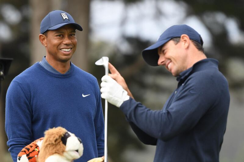 Tiger Woods talks to Rory McIlroy on the fourth tee during the first round of the 2020 PGA Championship at TPC Harding Park in San Francisco, California, on Thursday. AFP