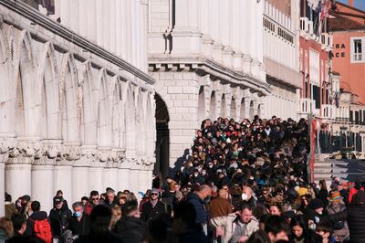 Crowds flock to Venice for the annual carnival celebrations in February last year. Reuters 