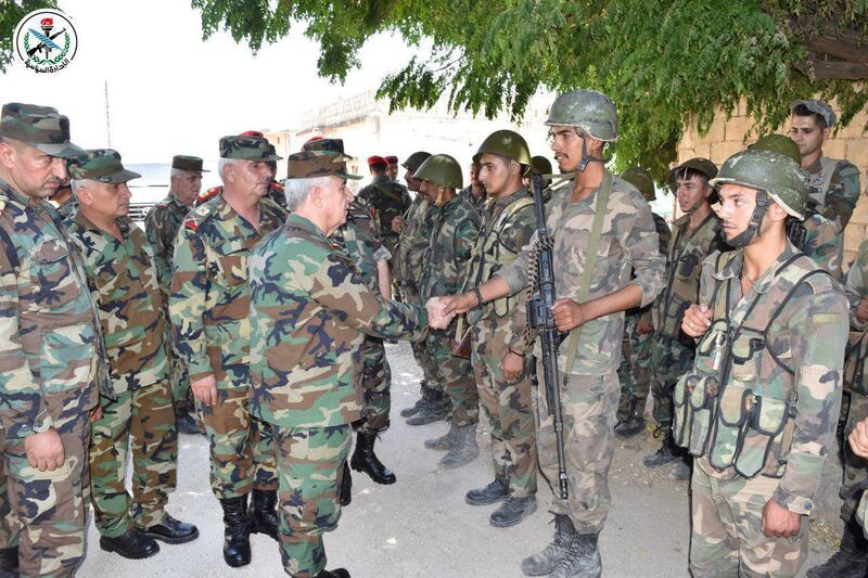 General Ali Abdullah Ayyoub, Syria's Defence Minister visits army soldiers in Al Hobeit in Idlib province, Syria. SANA via Reuters