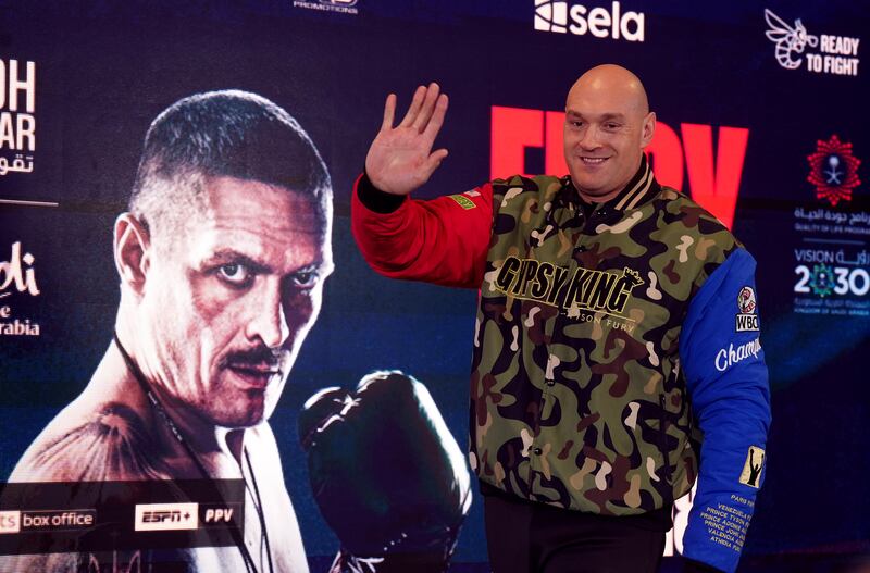 Tyson Fury arrives on stage. PA