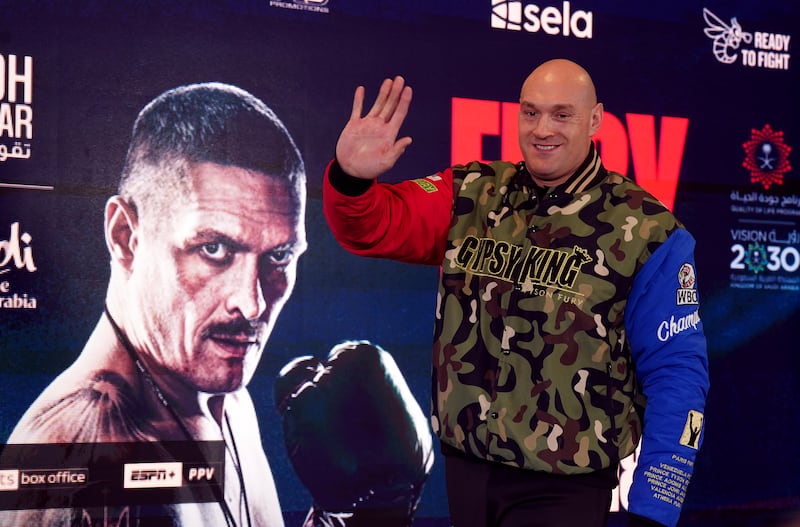 Tyson Fury arrives on stage. PA
