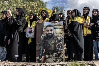Women cry during the funeral of a Hezbollah fighter killed yesterday in Kounine. Getty Images