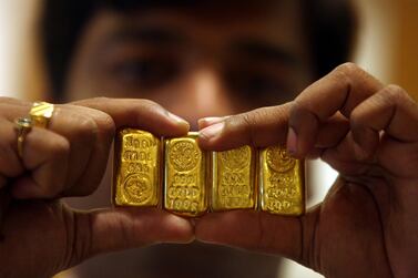 The Fed meeting and reversal in their policy outlook triggered the drop in gold prices. Photo: Reuters