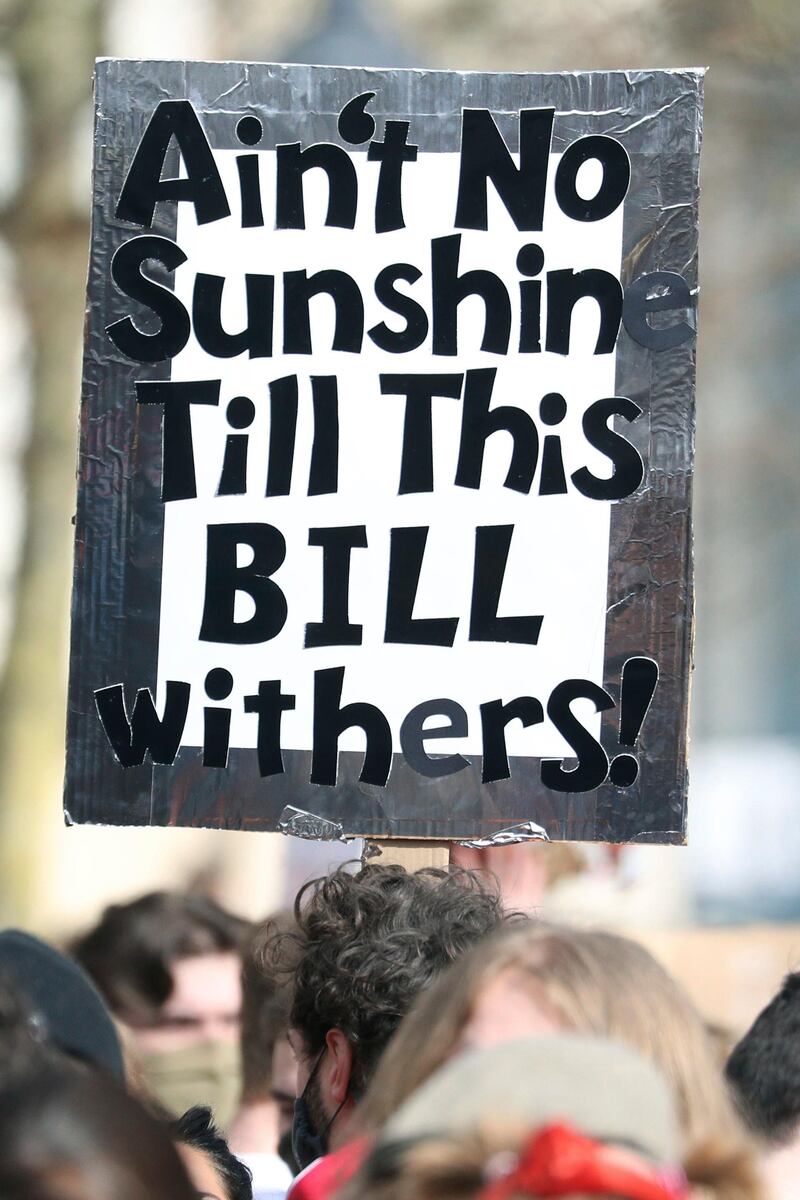 People take part in the 'Kill the Bill' protest in College Green, Bristol, demonstrating against the government's controversial Police and Crime Bill. AP