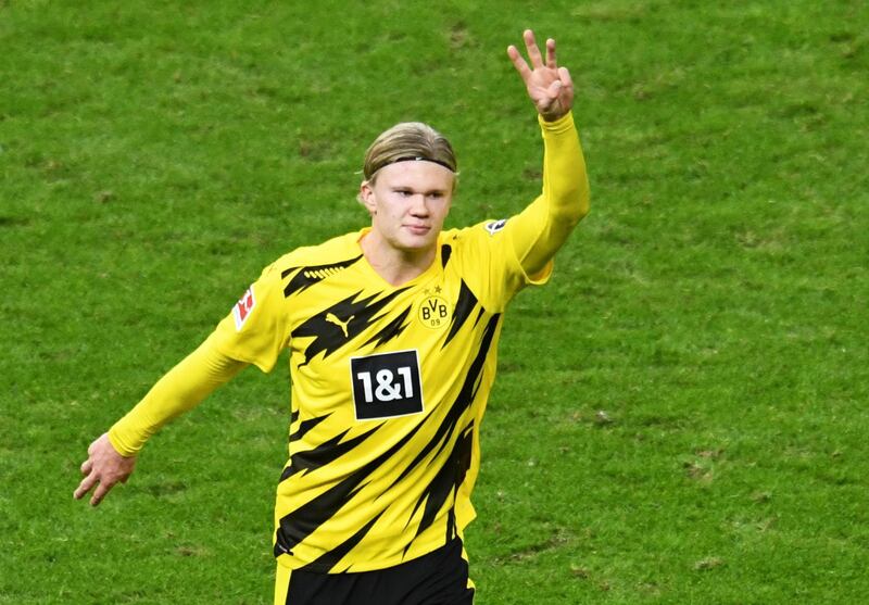 Erling Braut Haaland celebrates his hat-trick. Reuters