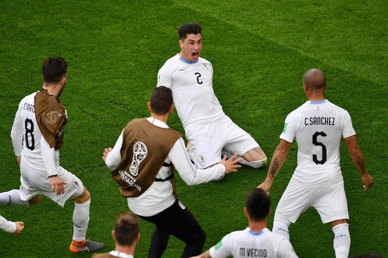 Uruguay's Jose Gimenez celebrates after scoring his team's only goal with teammates during their group A match with Egypt at the 2018 FIFA World Cup at the Yekaterinburg Arena in Yekaterinburg, Russia, on June 15, 2018. Dan Mullan / Getty Images