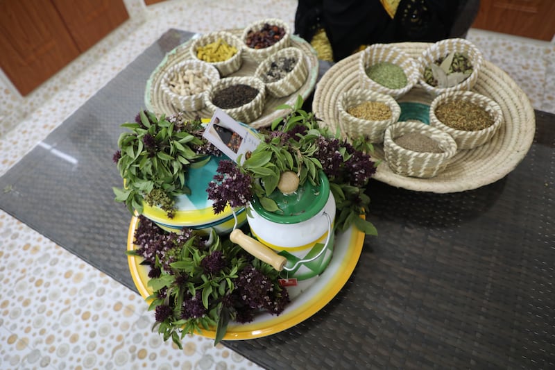 Fatima Mahmoud's serving tray with mashmoom or basil flowering plant.