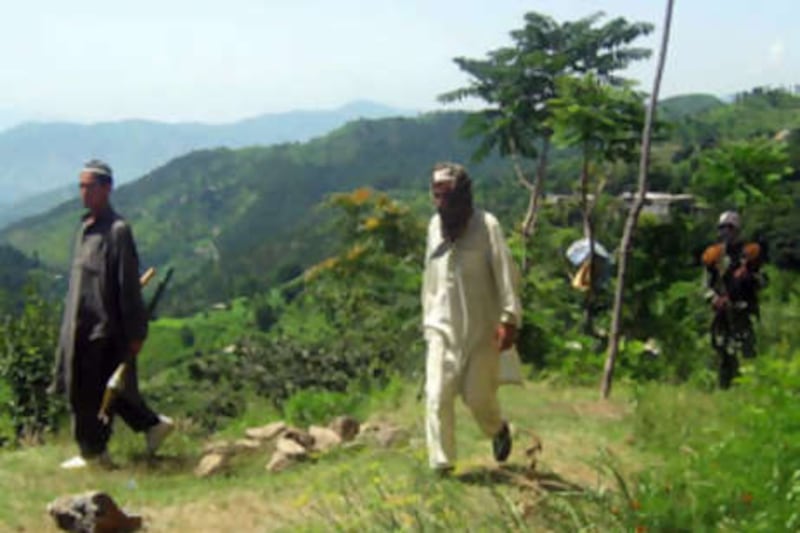 Pakistani Taliban fighters in mountainous Tarran, in the north-western Swat valley. AFP