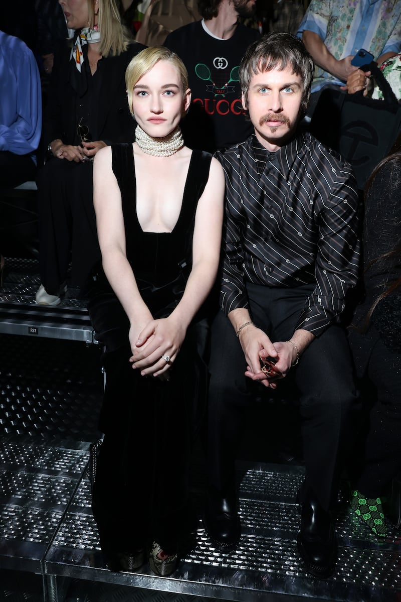Julia Garner and Mark Foster were among the many celebrities attending Gucci's spring/summer 2023 show in Milan, Italy. All photos: Getty Images