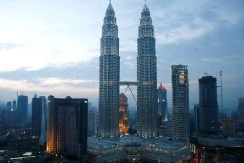 The Petronas Towers, the tallest twin towers in the world, are a spectacular landmark especially at sunset. John Brunton for The National