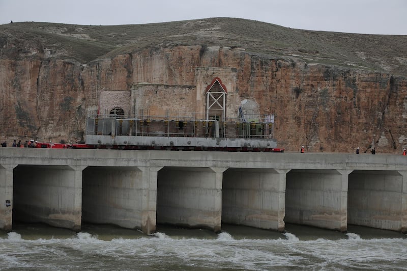 Er Rizk Mosque from the 15th century is transported from the ancient town of Hasankeyf by the Tigris river, which will be significantly submerged by the Ilisu dam, to the new Hasankeyf in southeastern Turkey.  Reuters