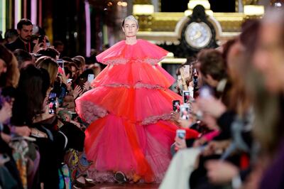 A model presents a creation by Schiaparelli during the 2019 Spring-Summer Haute Couture collection fashion show in Paris, on January 21, 2019. / AFP / Thomas SAMSON
