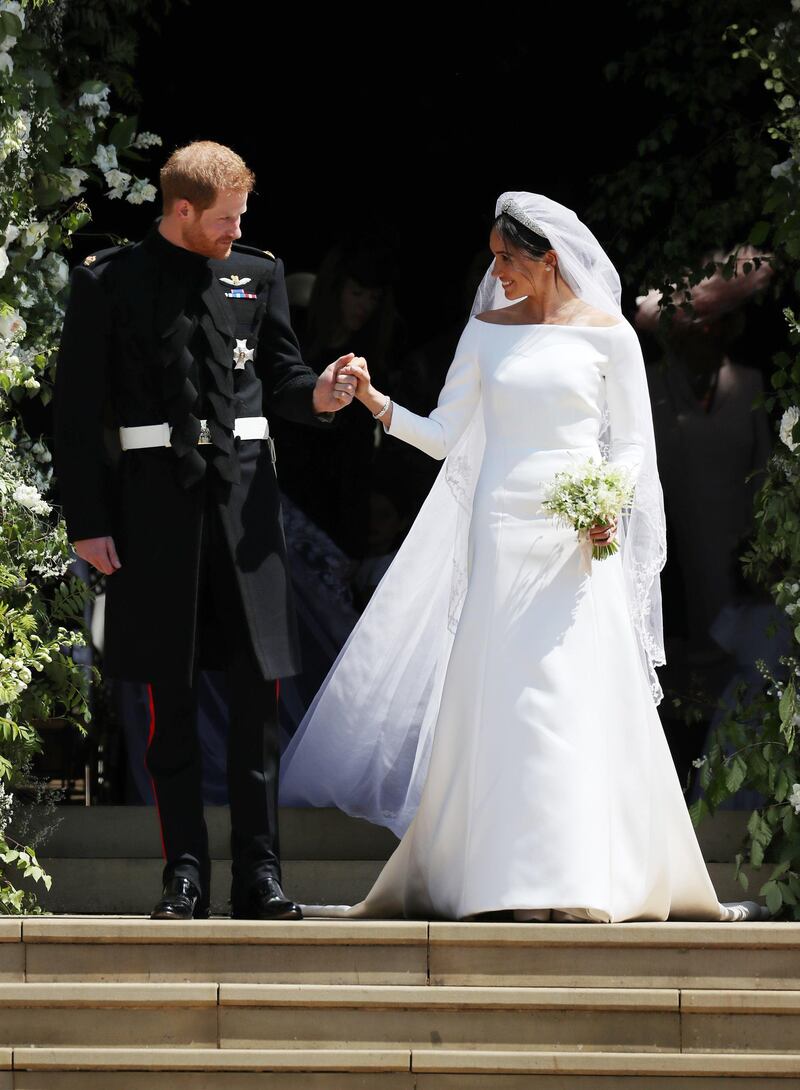 WINDSOR, UNITED KINGDOM - MAY 19:  Prince Harry and Meghan Markle leave St George's Chapel after their wedding in St George's Chapel at Windsor Castle on May 19, 2018 in Windsor, England. (Photo by Jane Barlow - WPA Pool/Getty Images)