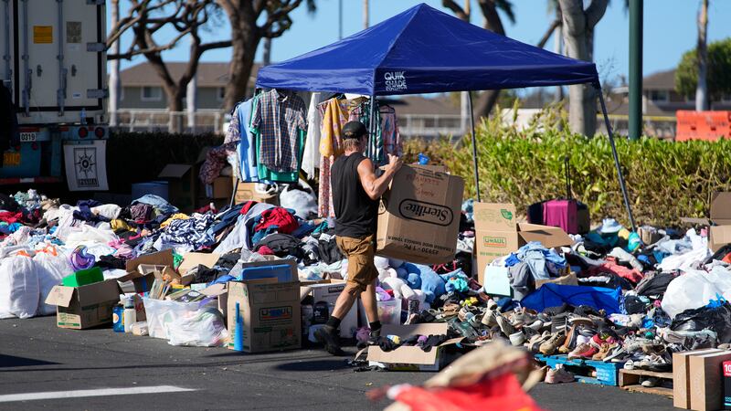 Donated clothes pile up in Lahaina. AP