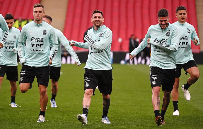 Lionel Messi (C) trains with Argentina teammates on the eve of the Finalissima Conmebol. EPA 