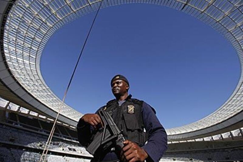 A South African policeman provides security at Cape Town stadium.