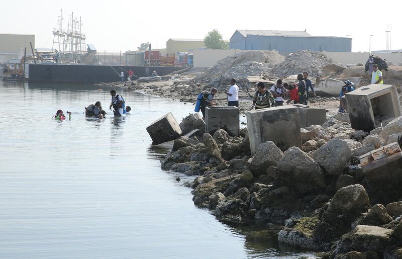 More than 50 divers volunteer to clean up the Mussaffah Canal on Sunday. Abu Dhabi Municipality