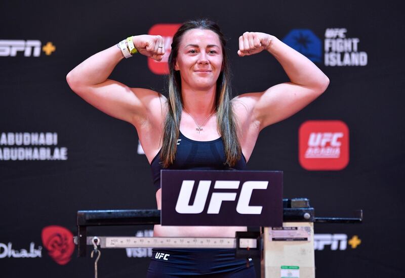 ABU DHABI, UNITED ARAB EMIRATES - JULY 14: Molly McCann of England poses on the scale during the UFC Fight Night weigh-in inside Flash Forum on UFC Fight Island on July 14, 2020 in Yas Island, Abu Dhabi, United Arab Emirates. (Photo by Jeff Bottari/Zuffa LLC via Getty Images)