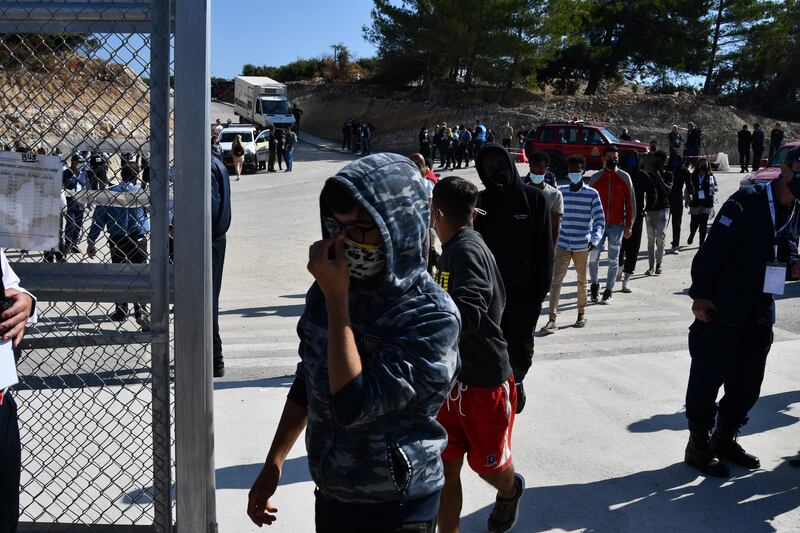 Migrants are moved from the closed camp on Samos Island, Greece, on October 22, 2021. EPA