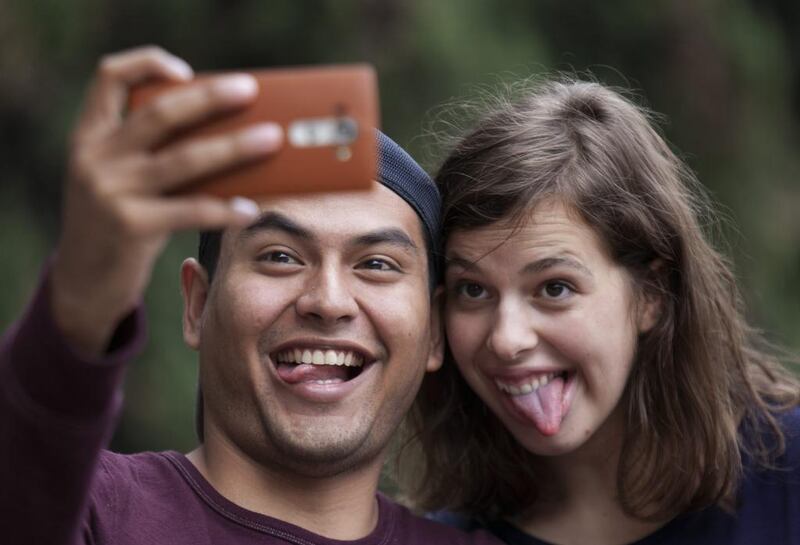 You can take happy snaps, but not record your feelings with a smartphone or camera. (Marco Ugarte / AP)