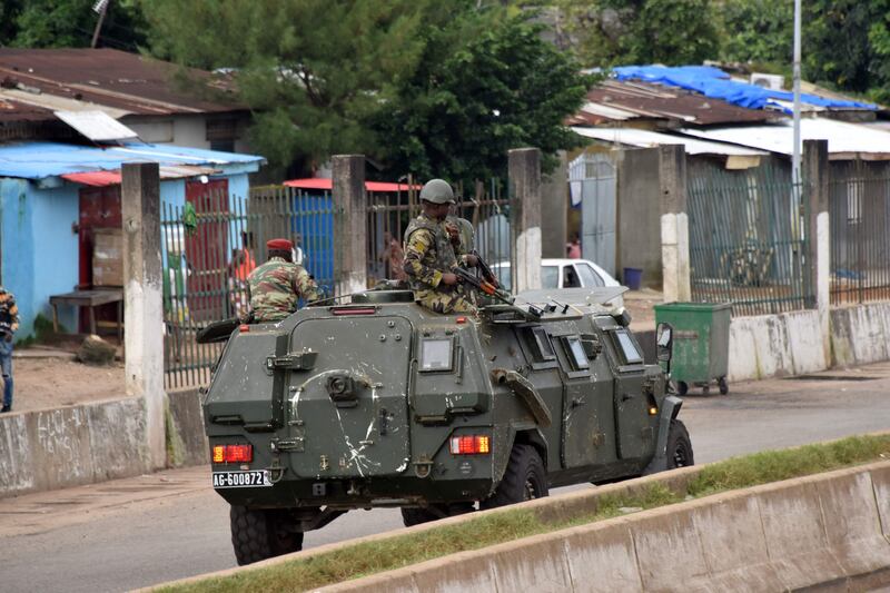 The soldiers have said they dissolved Mr Conde's government and seized power. AFP