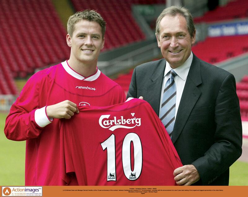 Michael Owen and Liverpool manager Gerard Houllier, at the 10 year anniversary of the contract between Carlsberg and Liverpool F.C. Action Images